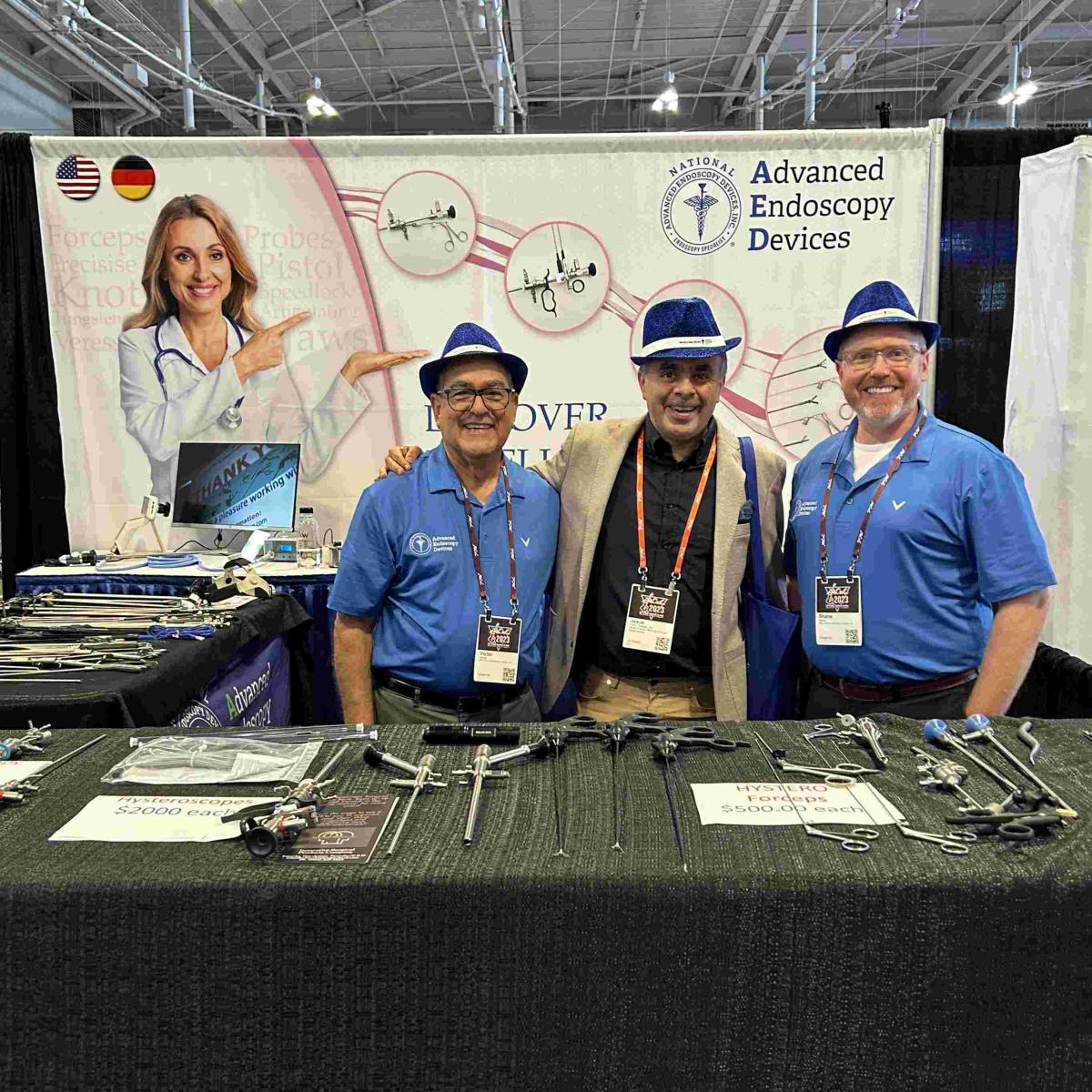 Advanced Endoscopy Devices at AAGL 2023 Photos Nashville - 3 People taking a photo